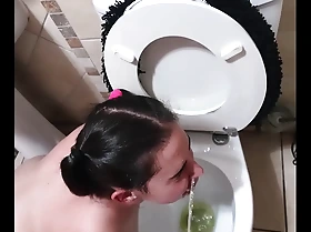 Pigtailed teen deepthroats dick after beastlike stewed to the gills on and licking get lower than beneath one's toilet clean facet spitting and spanking