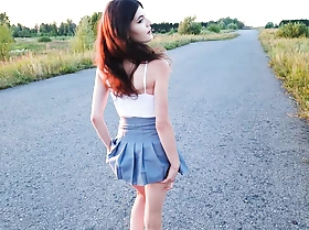 A romantic evening walk in nature ended with sex in garments in a beautiful meadow neighbouring the road