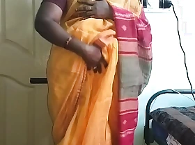 Desi indian sex-mad tamil telugu kannada malayalam hindi horny white wife vanitha crippling orange colour saree showing big bosom and bald slit press hard bosom press nip rubbing slit masturbation