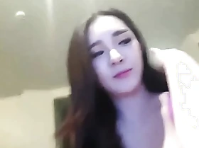 Korean web camera model shows she has milk in their way titties