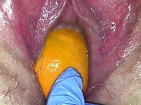 Tight vagina milf gets her vagina destroyed with a orange together with chubby apple popping it out of her tight hole making her squirt